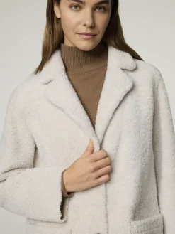 Reversibler Lammfellmantel