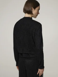 Strickjacke mit Rüschen