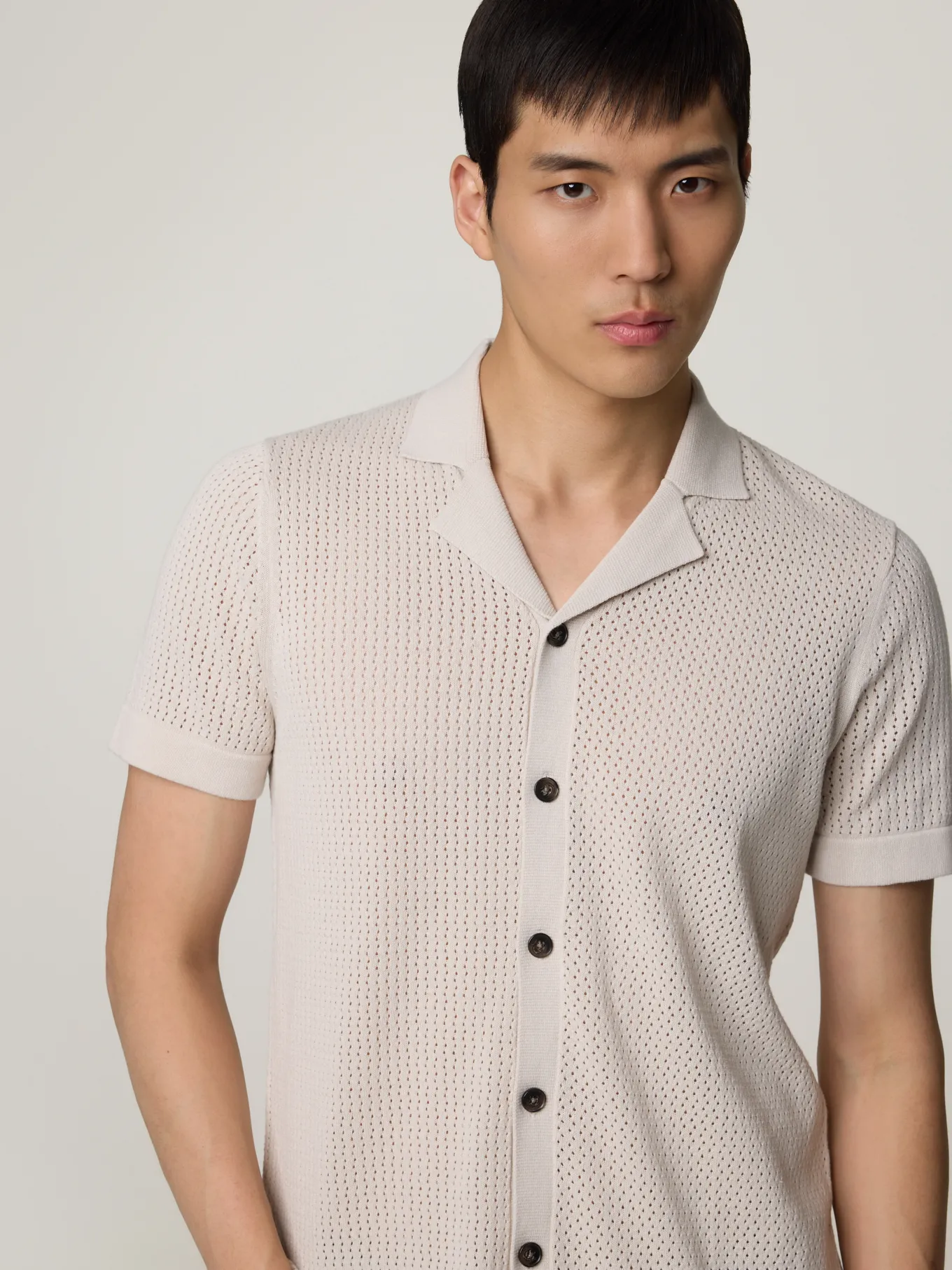 Strickpolo im Slim Fit