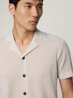 Strickpolo im Slim Fit